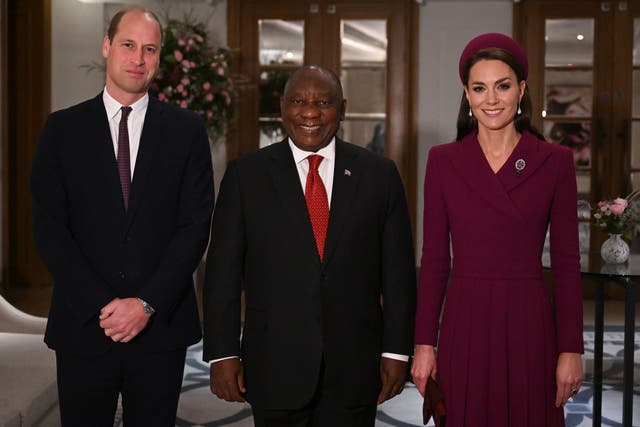 President Cyril Ramaphosa of South Africa is greeted by the Prince and Princess of Wales (Justin Tallis/PA)