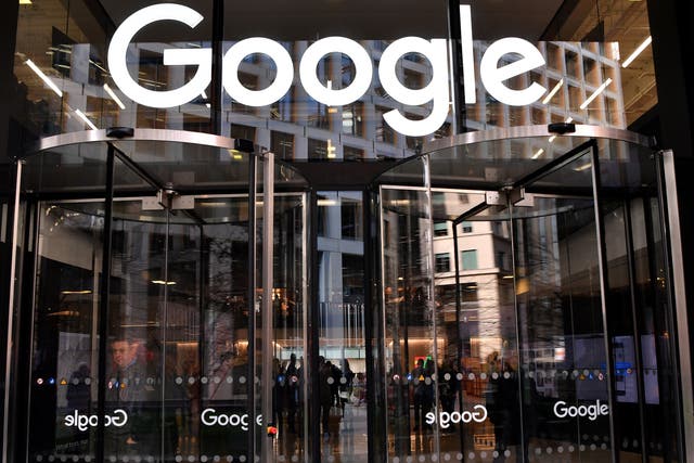 <p>A logo is pictured above the entrance to the offices of Google in London</p>