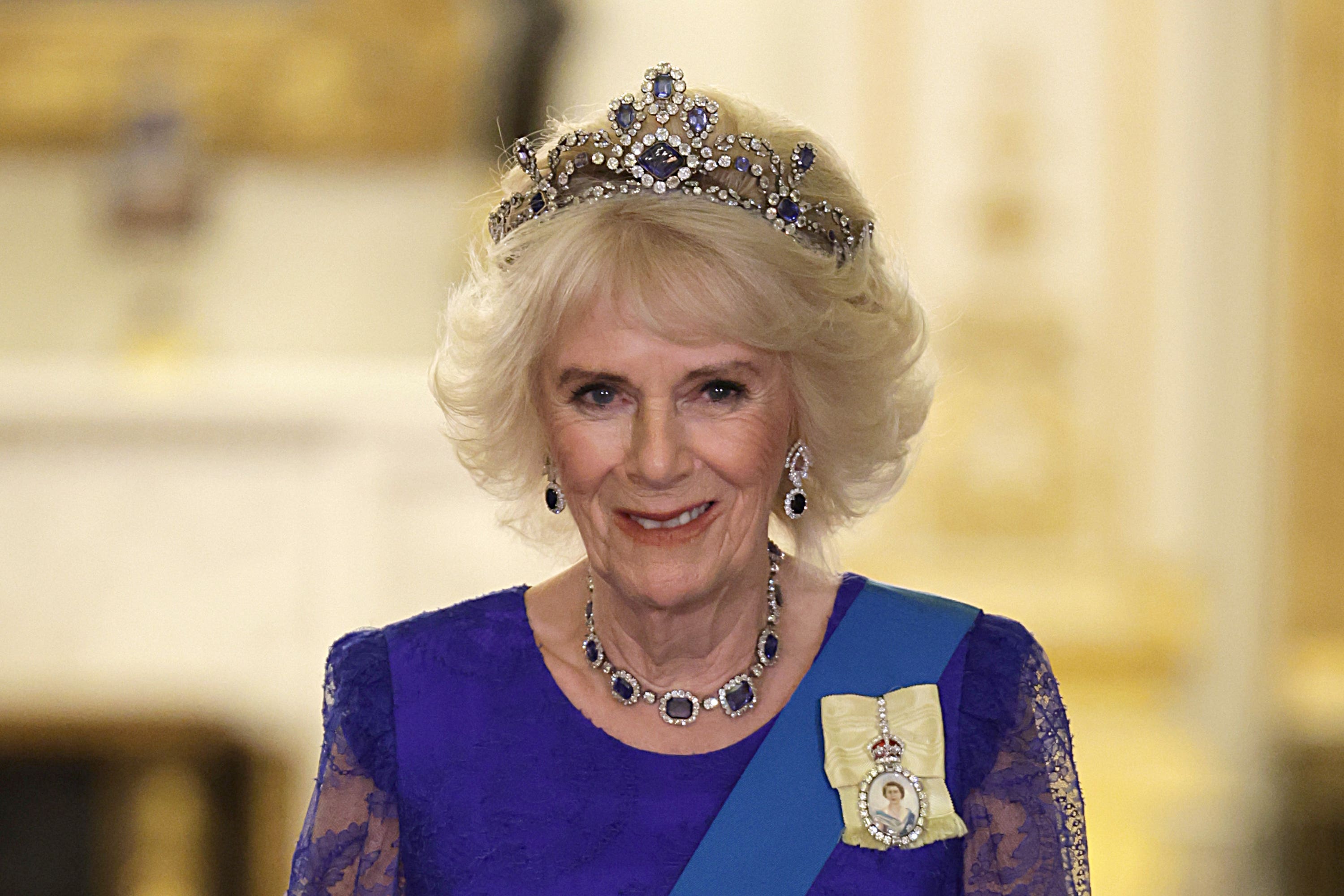The Queen Consort in the late Queen’s sapphire and diamond tiara (Chris Jackson/PA)