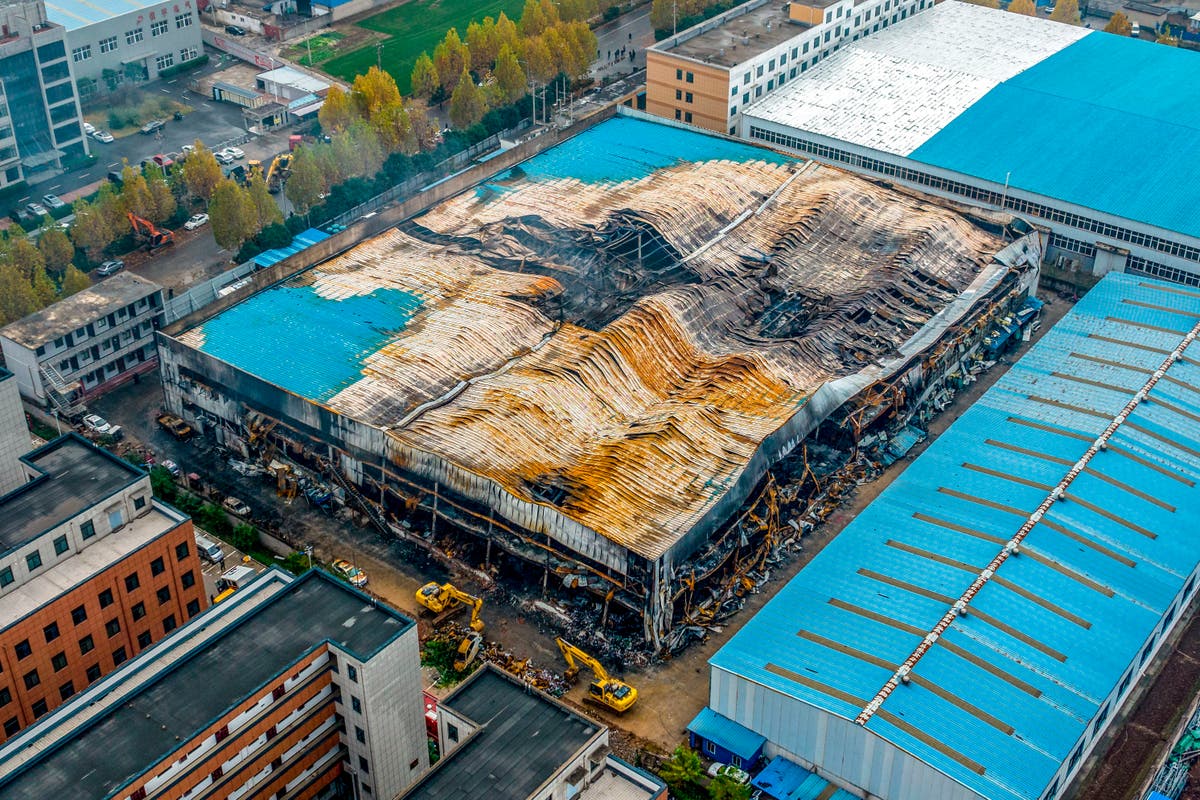 4 detained over China trading company fire that killed 38