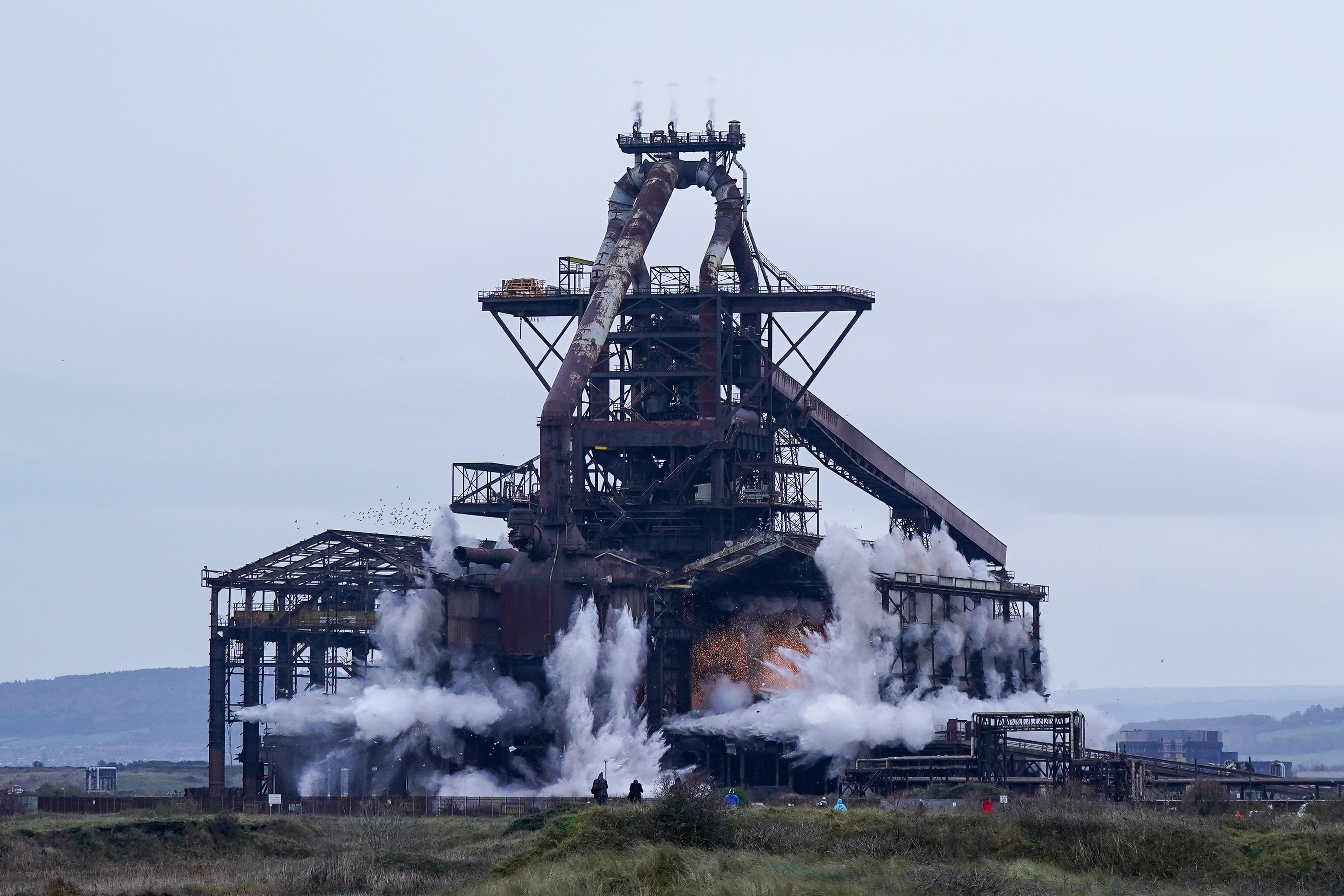 The former steel blast furnace near Redcar is brought down in an explosive demolition