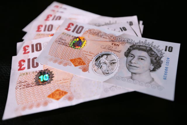Banknote printer De La Rue has warned over job cuts as it looks to ramp up cost savings after swinging to a loss and warning over full-year results for the third time this year (Chris Ratcliffe/PA)