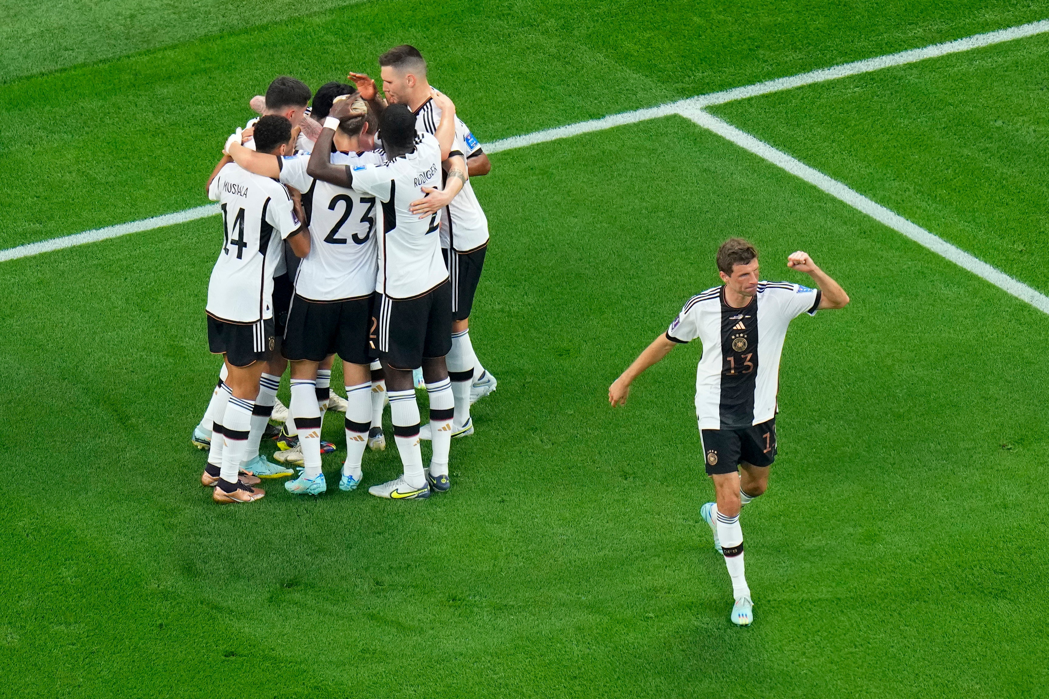 Germany celebrate after scoring from the spot