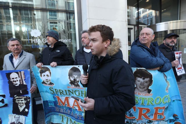 Ryan Murphy, the grandson of Terry McCafferty who was shot dead by loyalists in 1974, takes part in the Stand Against Britain’s Bill Of Shame Rally, outside the Northern Ireland Office UK Government Hub, at Erskine House in Belfast. (Liam McBurney/PA)