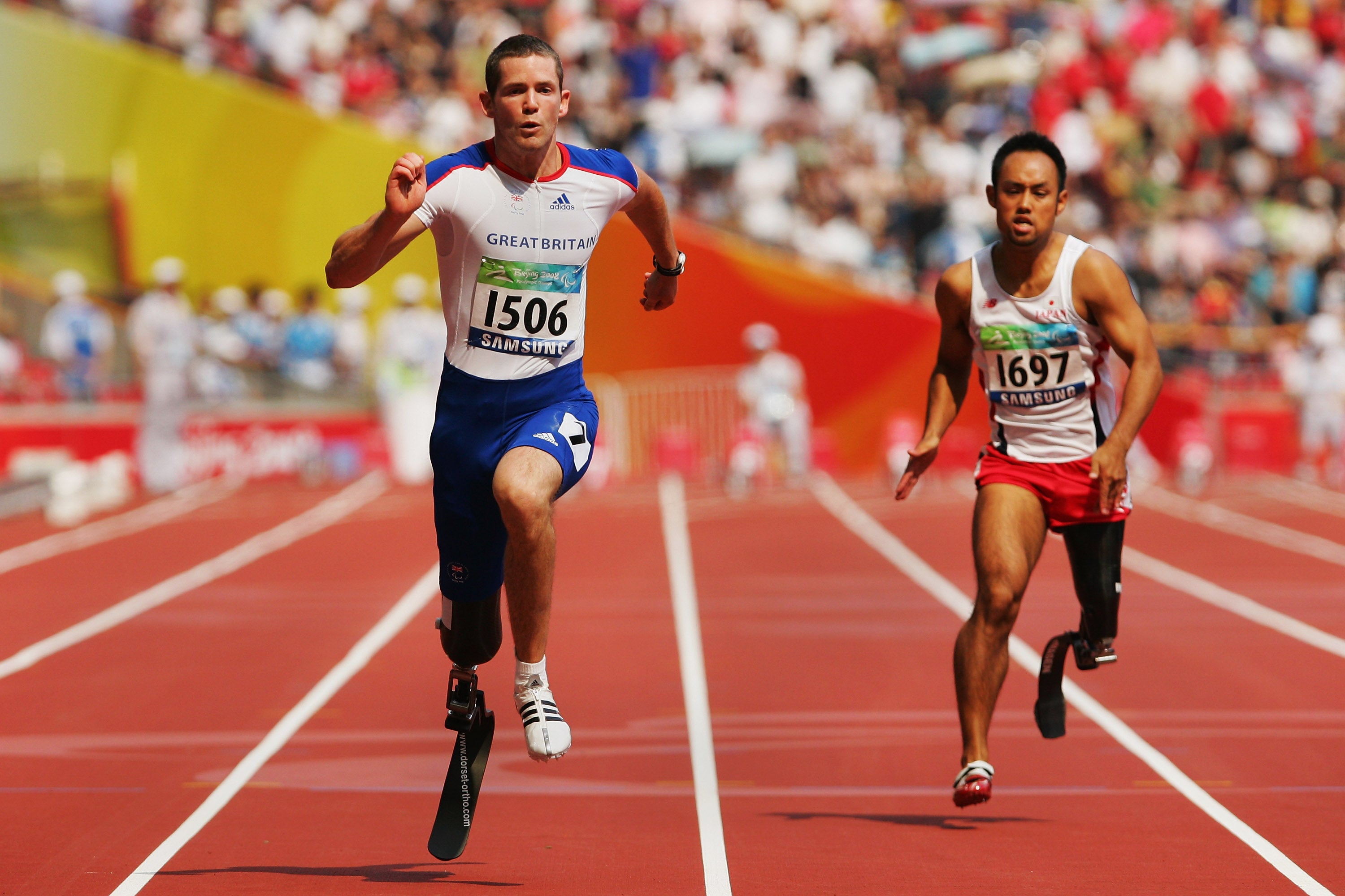 McFall in the Men’s T42 100m final at the 2008 Beijing Paralympics beside Japan’s Atsushi Yamamoto
