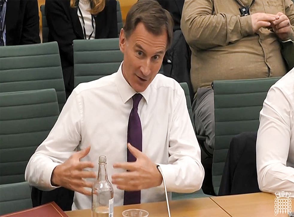 <p>A video grab from footage broadcast by the UK Parliament's Parliamentary Recording Unit (PRU) shows Britain's Chancellor of the Exchequer Jeremy Hunt speaking to the Commons Treasury Committee about the autumn budget statement in London on 23 November 2022 </p>