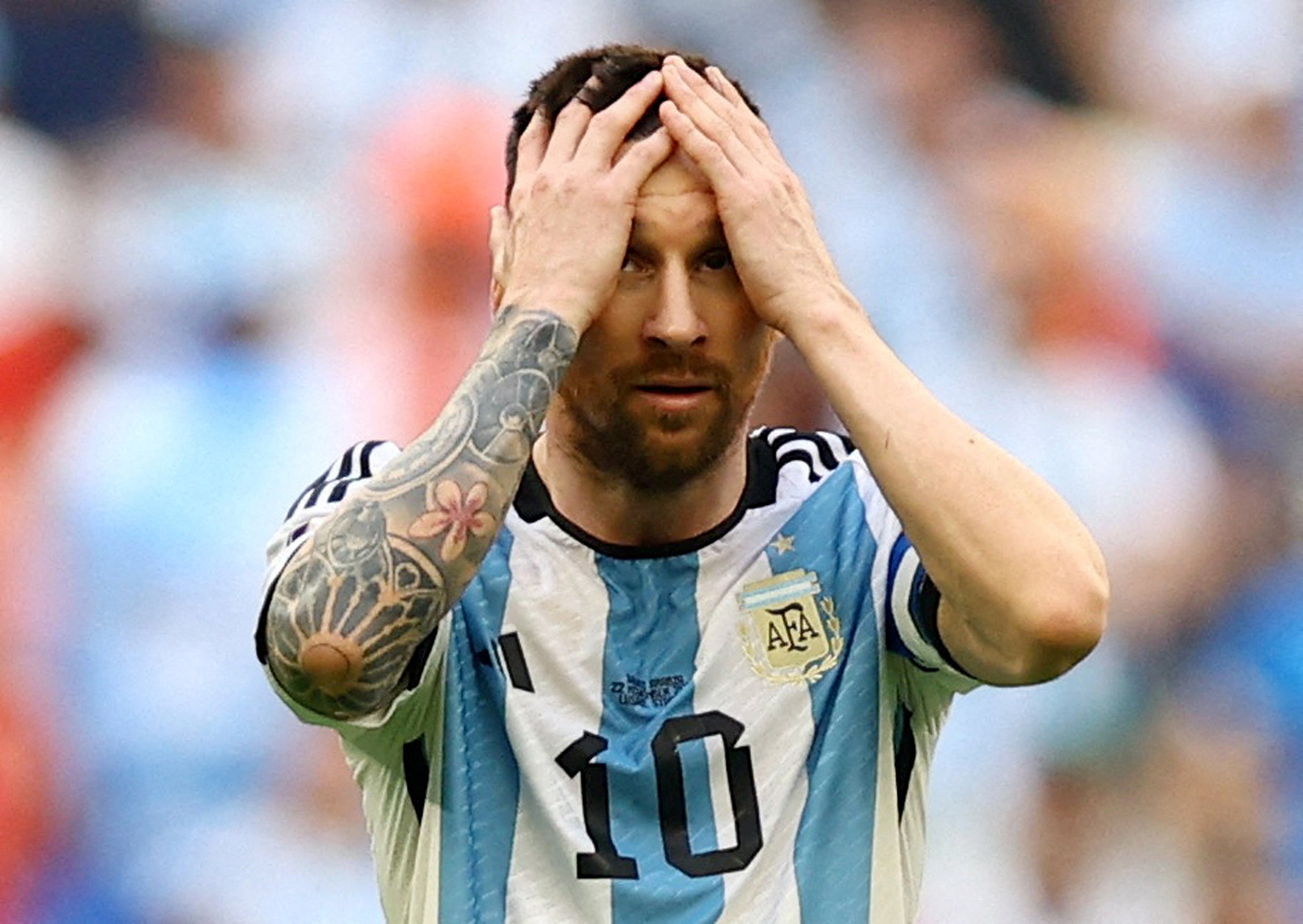 Lionel Messi reacts after his side lost to Saudi Arabia in their opening match