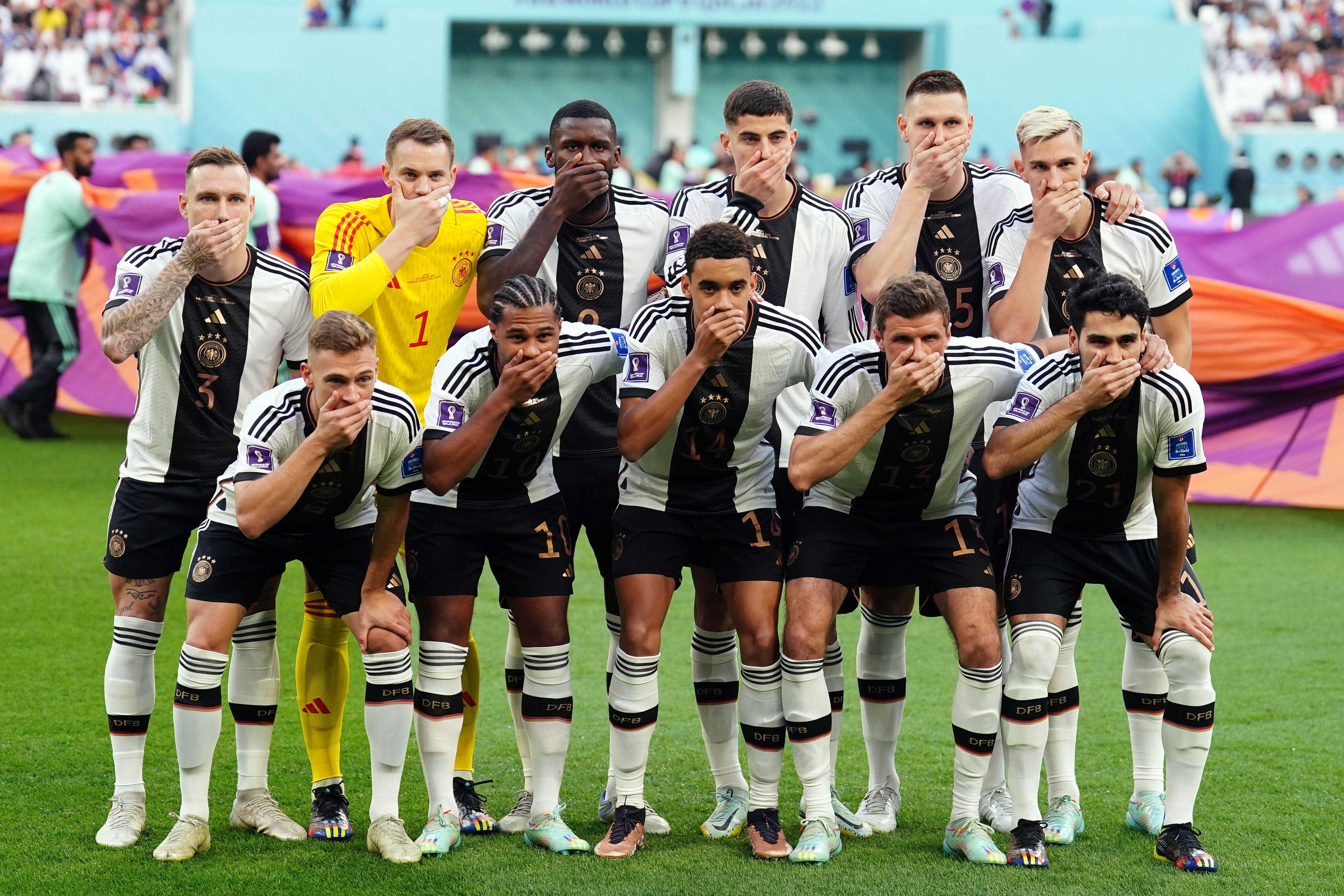 Germany players covered their mouths as a mark of protest at the Khalifa International Stadium in Doha
