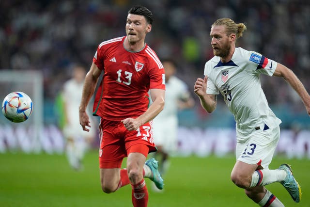 Wales striker Kieffer Moore (left) hopes to punish Iran in the air on Friday (Ashley Landis/AP)