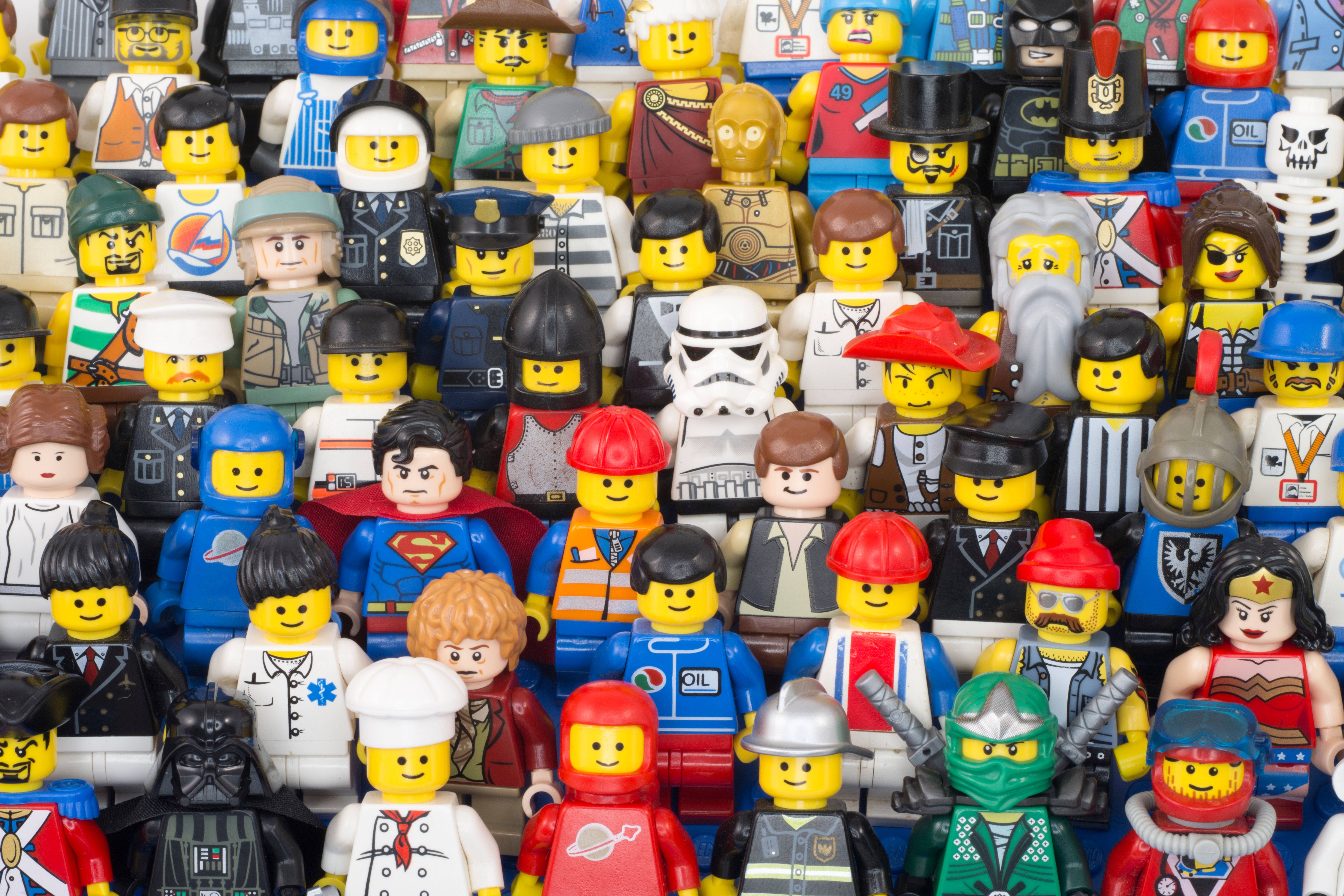 Lego minifigures both classic and modern versions from early 80’s spaceman to Stormtroopers and a Hobbit (Chris Willson/Alamy/PA)