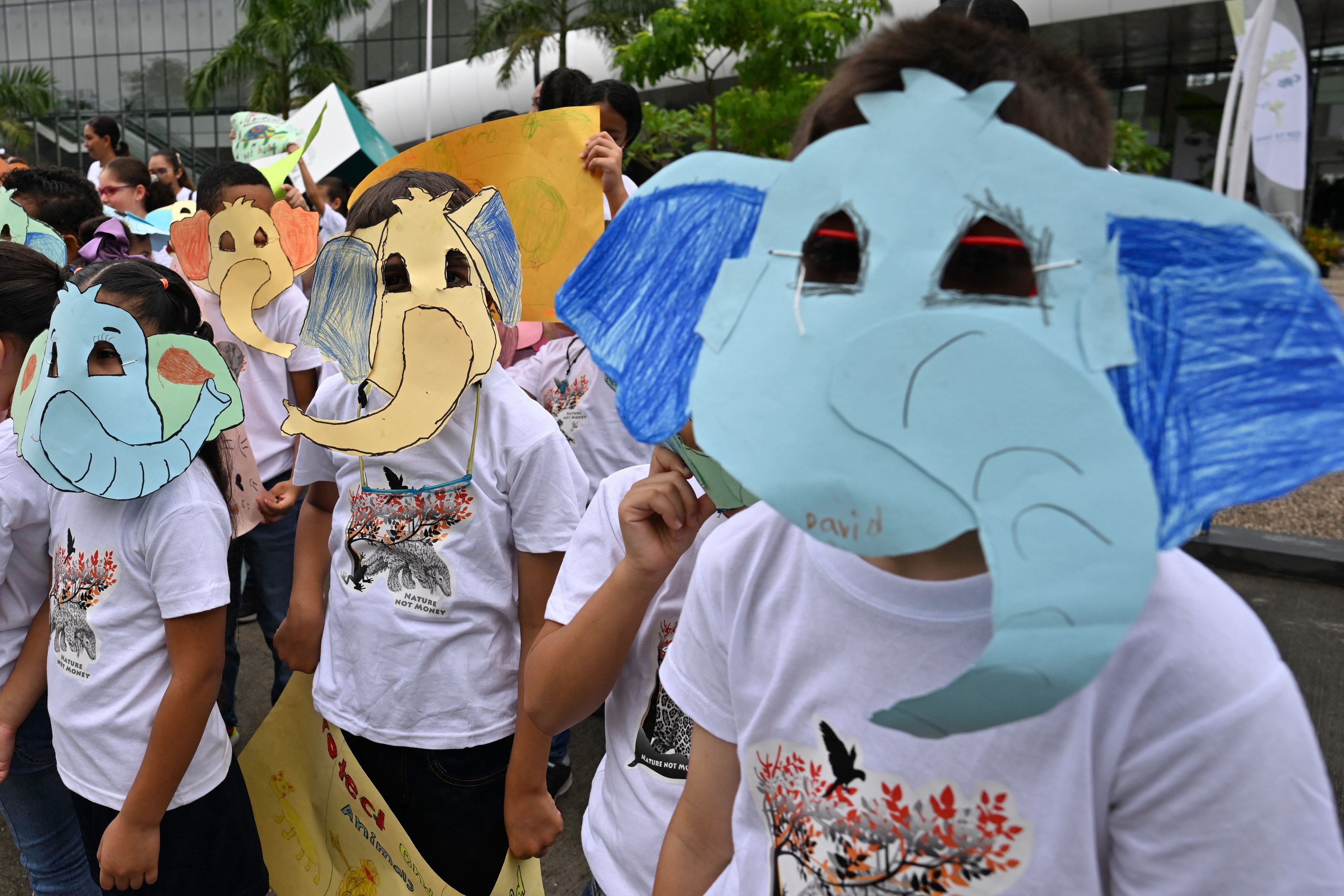 Students wearing animal masks protest during the opening day of the World Wildlife Conference, Cites Cop19, in Panama City