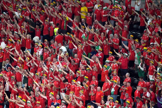 Wales fans in the stands during the Fifa World Cup Group B match at the Ahmad Bin Ali Stadium, Al-Rayyan, Qatar. Picture date: Monday November 21, 2022.