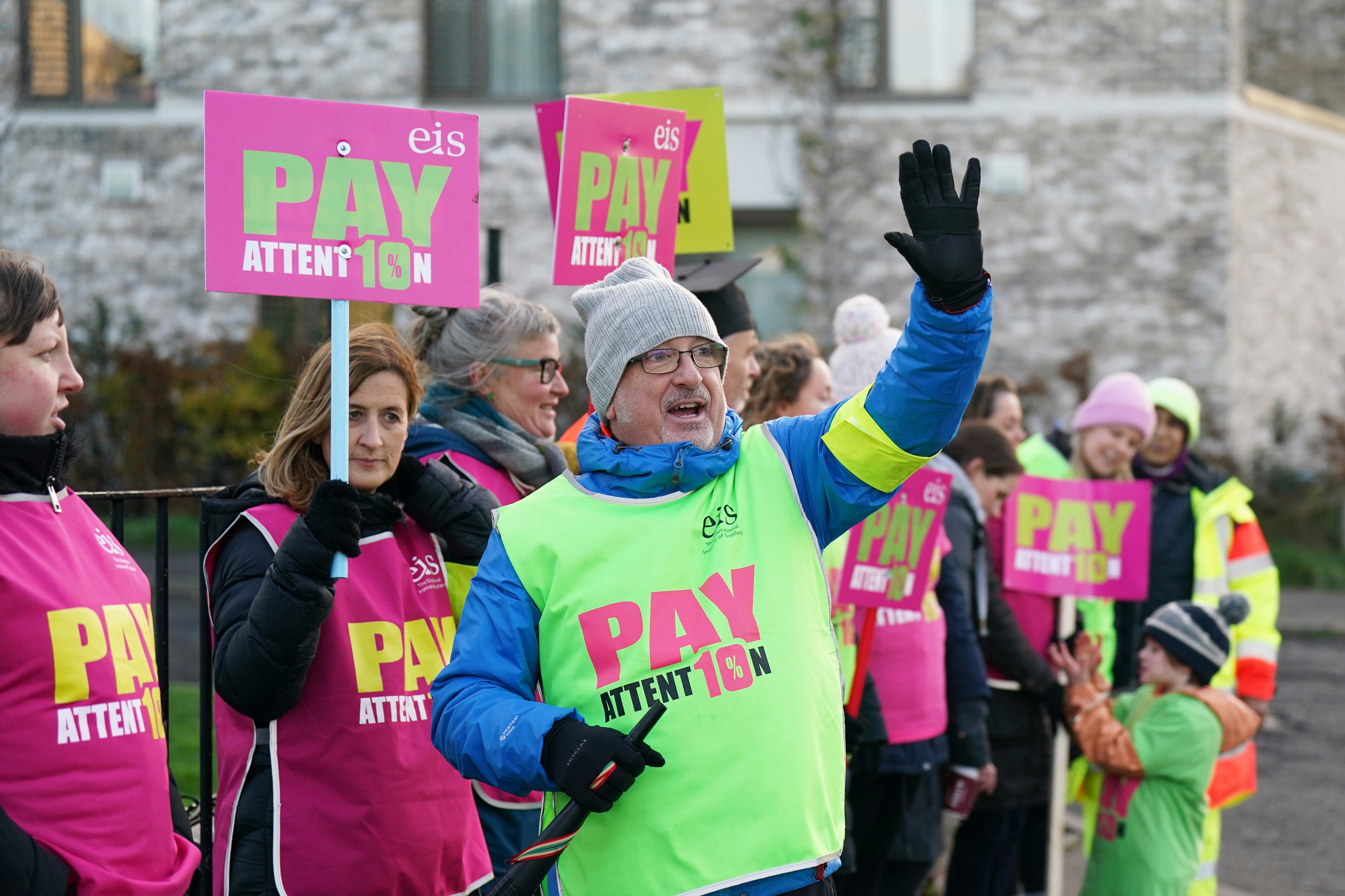 Teachers on the picket line outside Oxgangs Primary School in Edinburgh (Jane Barlow/PA)