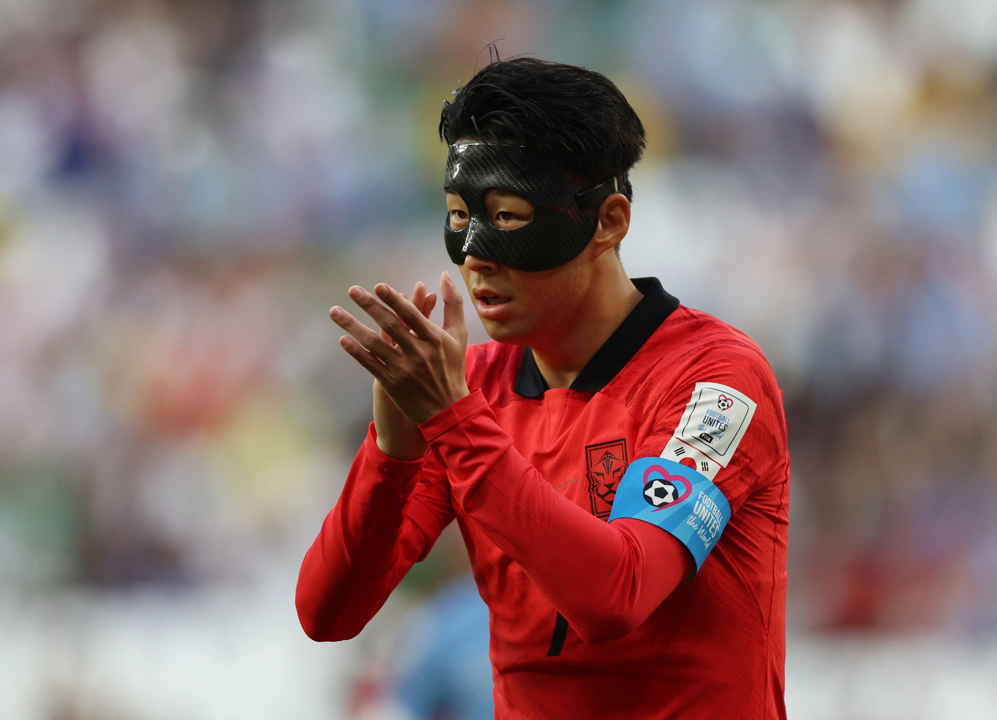 Why is Son Heungmin wearing a mask for South Korea at…