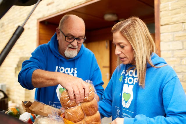 <p>Volunteer Steve Greenwood and Louise Reed, founder and CEO of Focus4Hope</p>