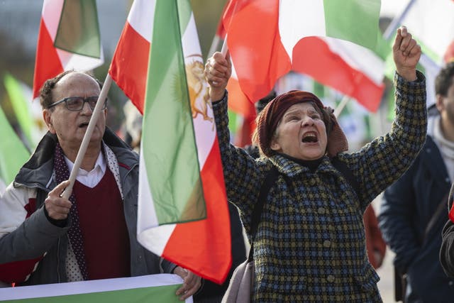 <p>Iranians stage a protest in front of the European headquarters of the UN  in Geneva during a Human Rights Council’s special session</p>