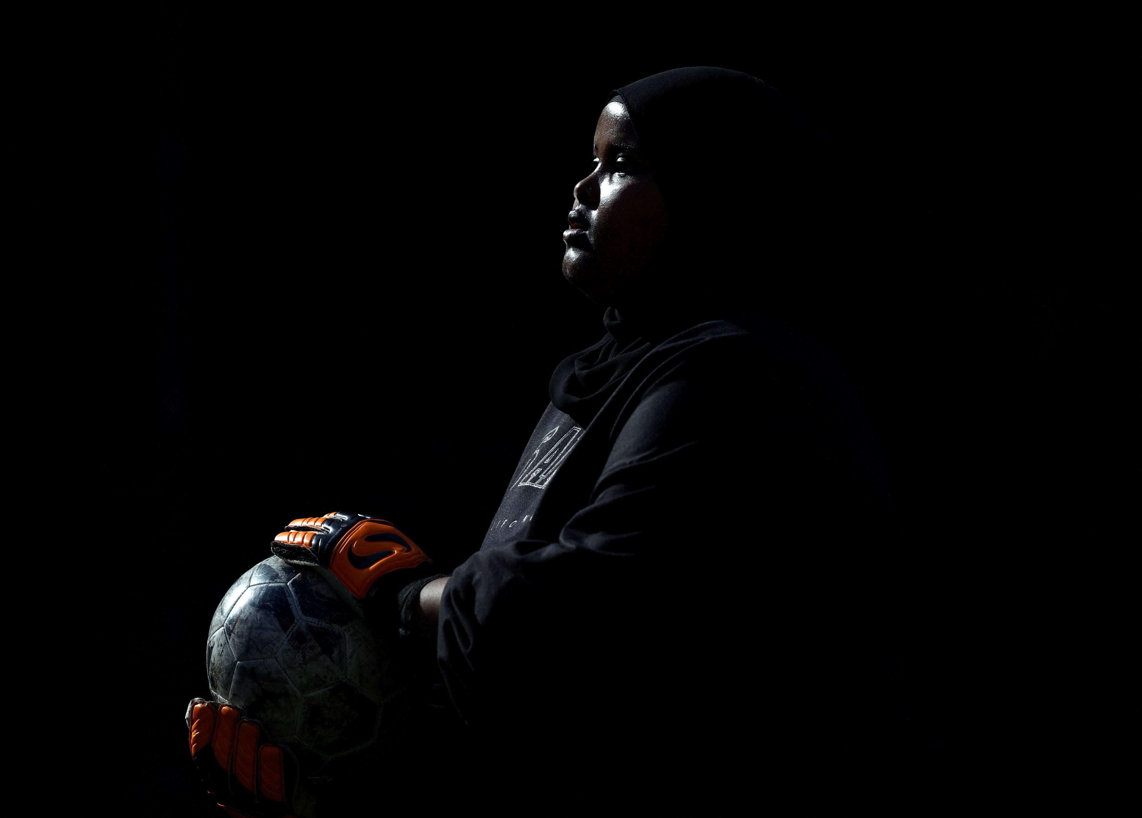 Sisterhood FC goalkeeper, Fahiima Yusuf, 19, holds the ball during a Ladies Super Liga 5-a-side match at The Colombo Centre