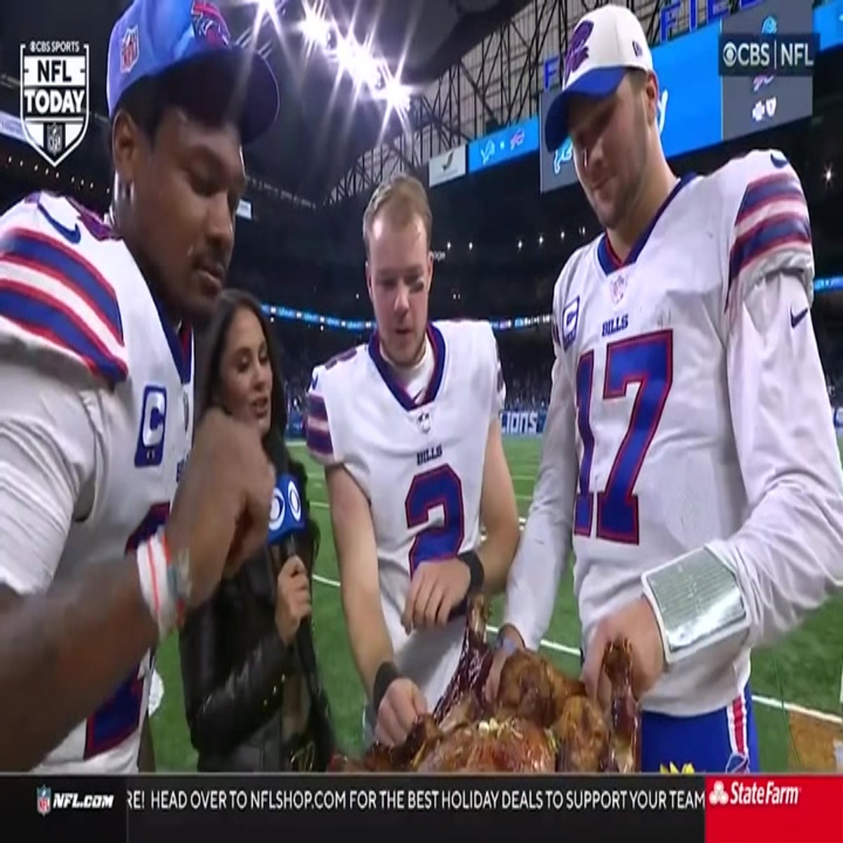 NFL: Buffalo Bills players tuck into turkey on pitch for