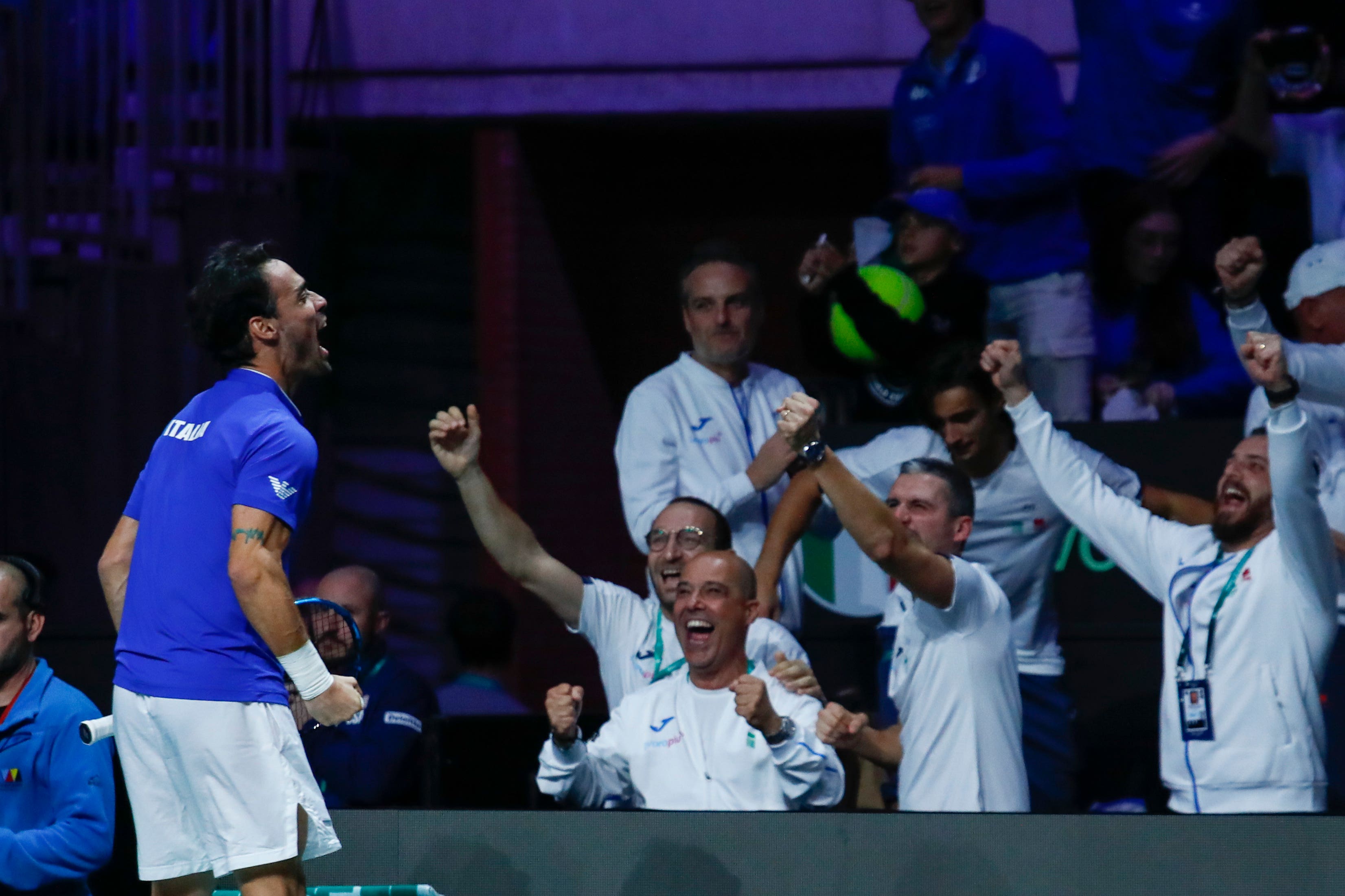Fabio Fognini celebrates helping secure Italy’s victory (Joan Monfort/AP)