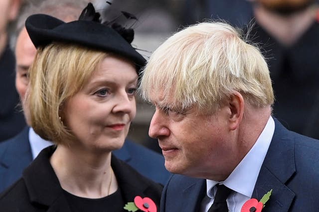 <p> Liz Truss and Boris Johnson attend the Remembrance Sunday ceremony at the Cenotaph</p>