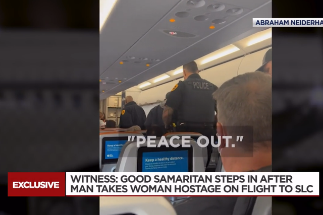 <p>A passenger travelling on a flight from New York to Salt Lake City held a woman hostage with a razor blade before a Good Samaritan managed to talk him down</p>