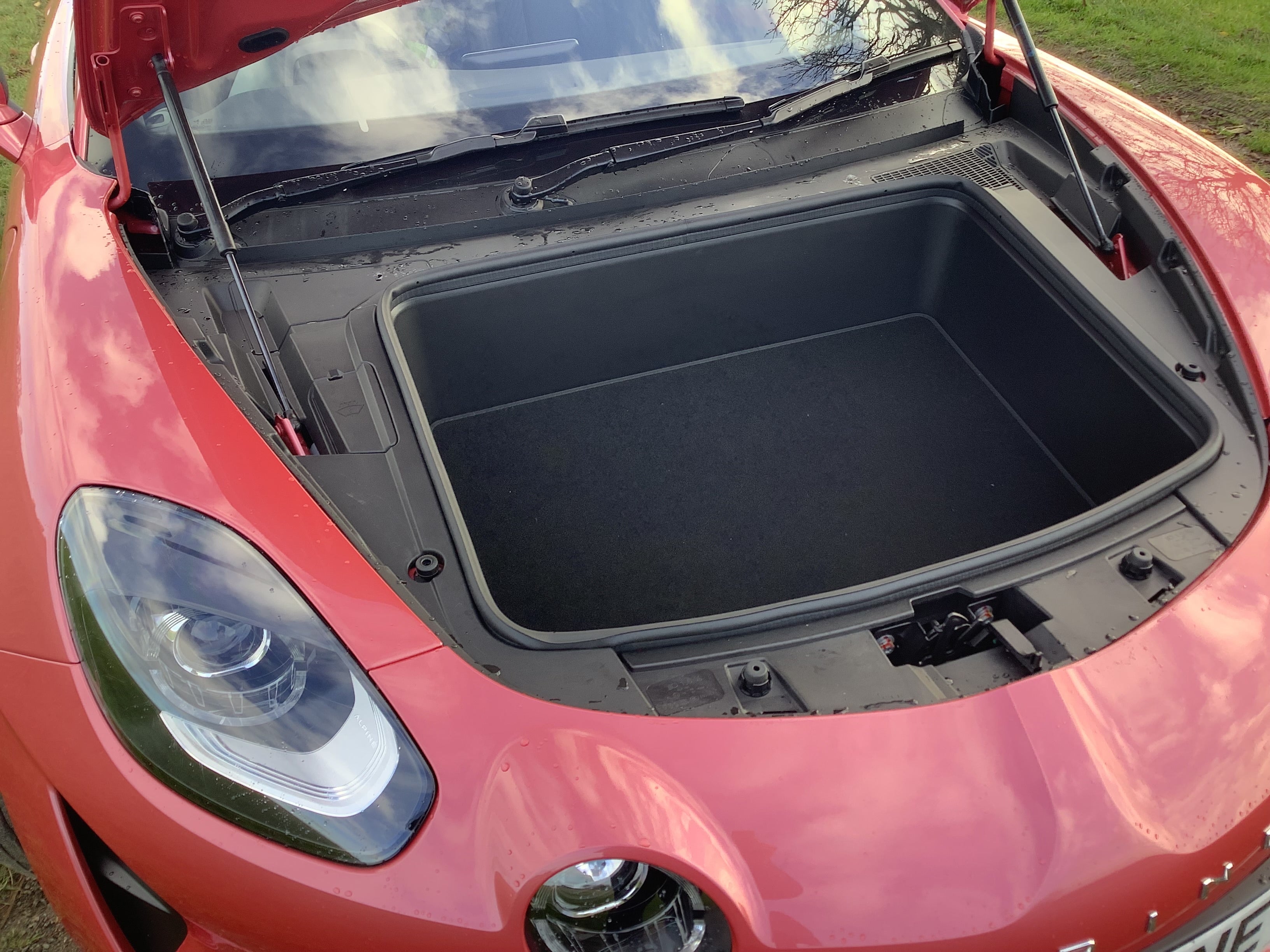 Compartments in the bonnet and behind the engine are sufficient for a couple of overnight bags