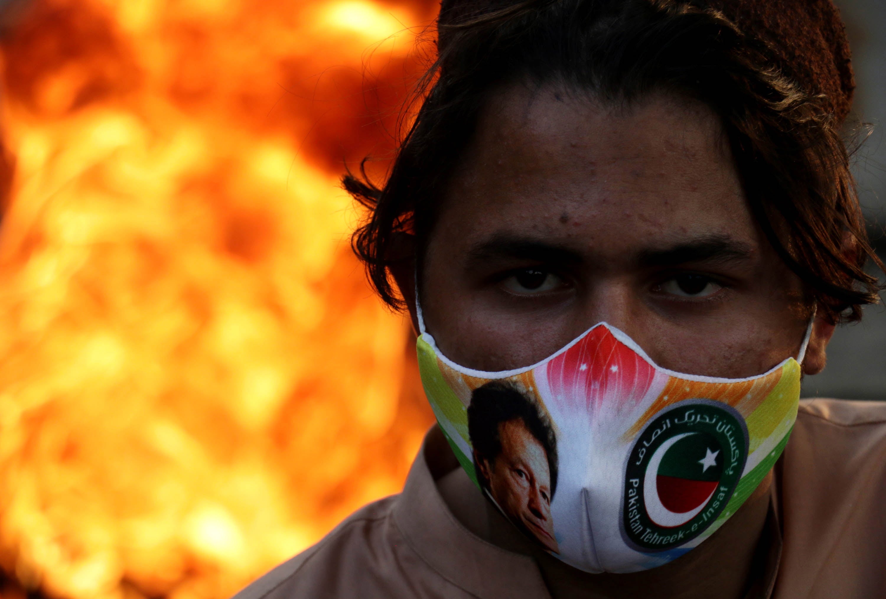 A supporter of Imran Khan during a protest following the attack on the former prime minister, in Rawalpindi, Pakistan, 7 November