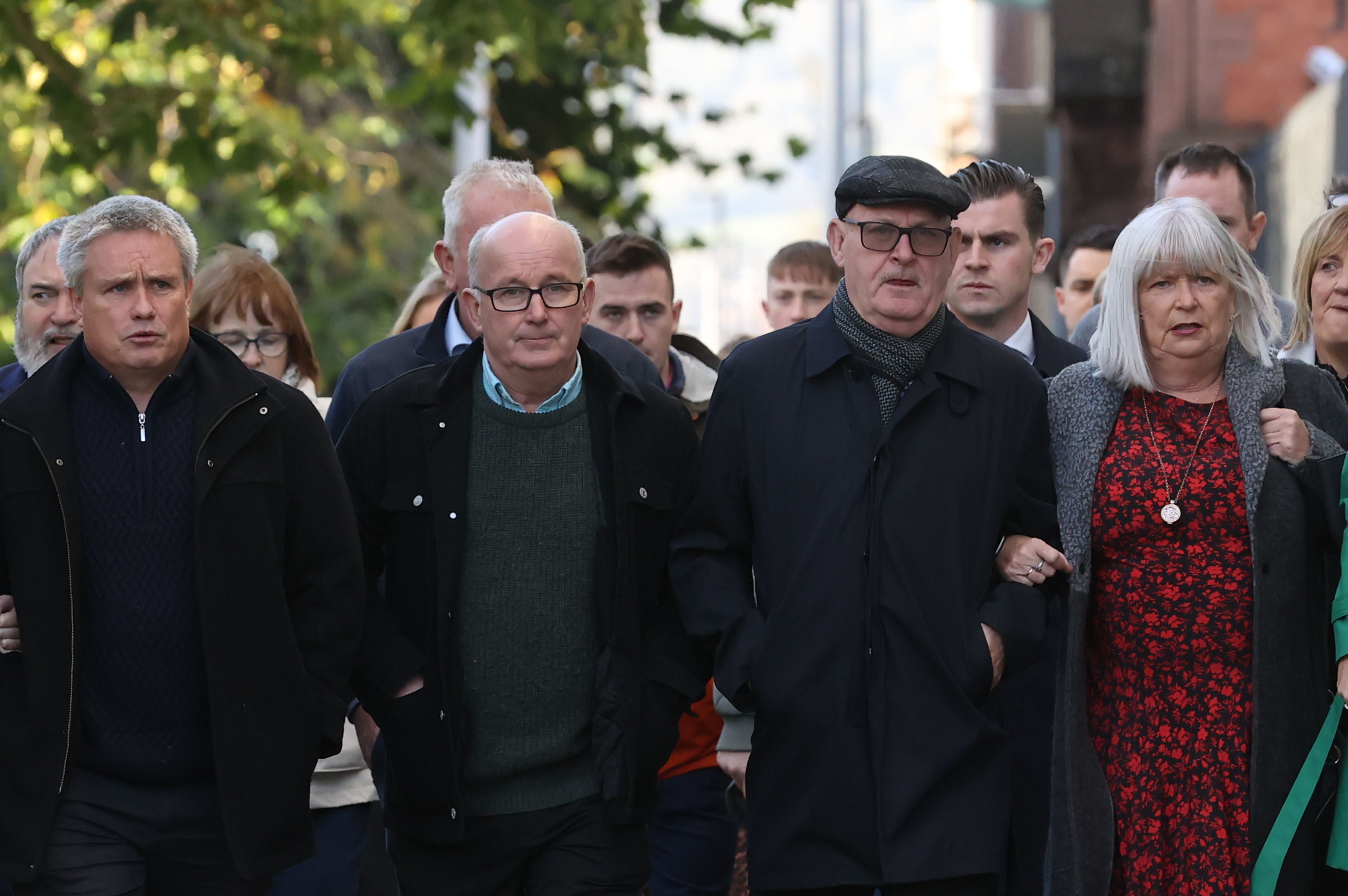 Family members of Aidan McAnespie, (left to right) cousin Brian Gormley, brothers Gerard and Sean and sister Margo, arrive with supporters at Laganside Courts in Belfast