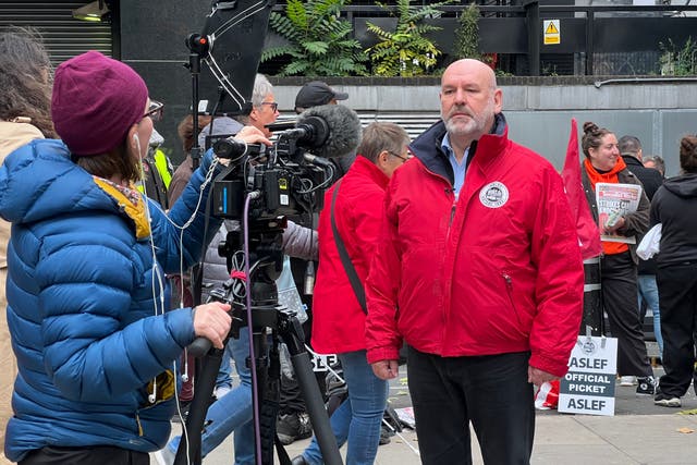 <p>Red brigade? Mick Whelan, general secretary of the train drivers’ union, Aslef, at London Euston during a strike in 2022 </p>