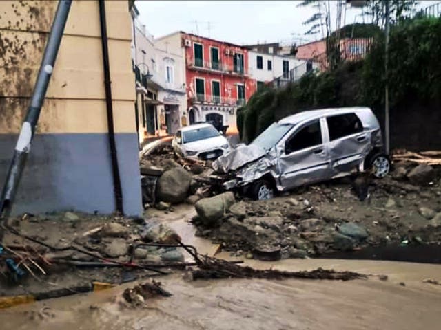 <p>Destroyed cars are pictured in Casamicciola after heavy rains caused a landslide</p>