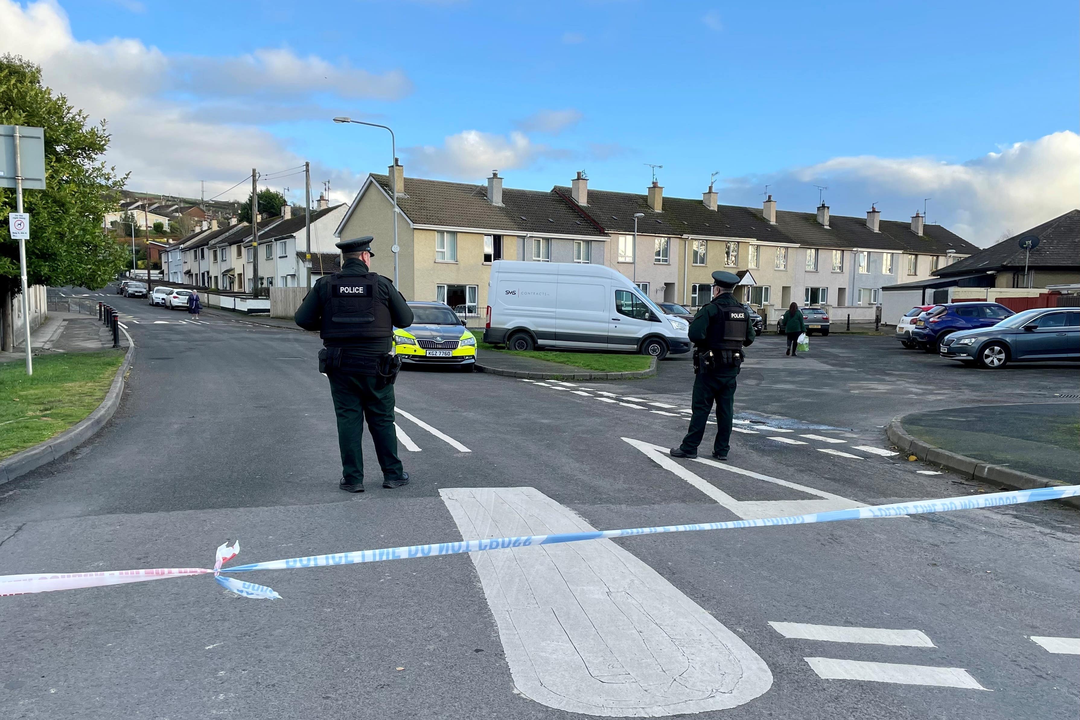 Officers from the PSNI at the scene of the attack (David Young/PA)