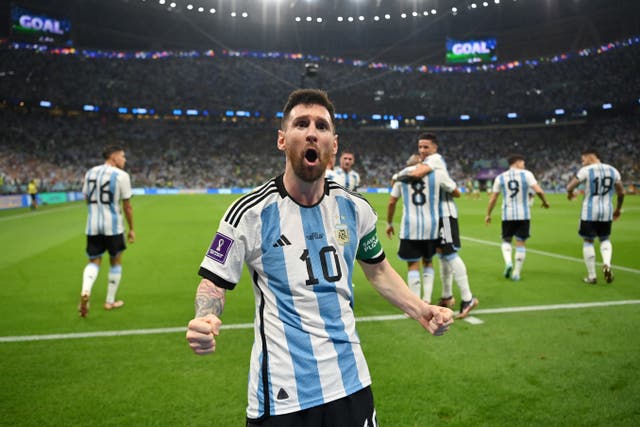 <p>Lionel Messi celebrates after scoring Argentina’s first goal</p>