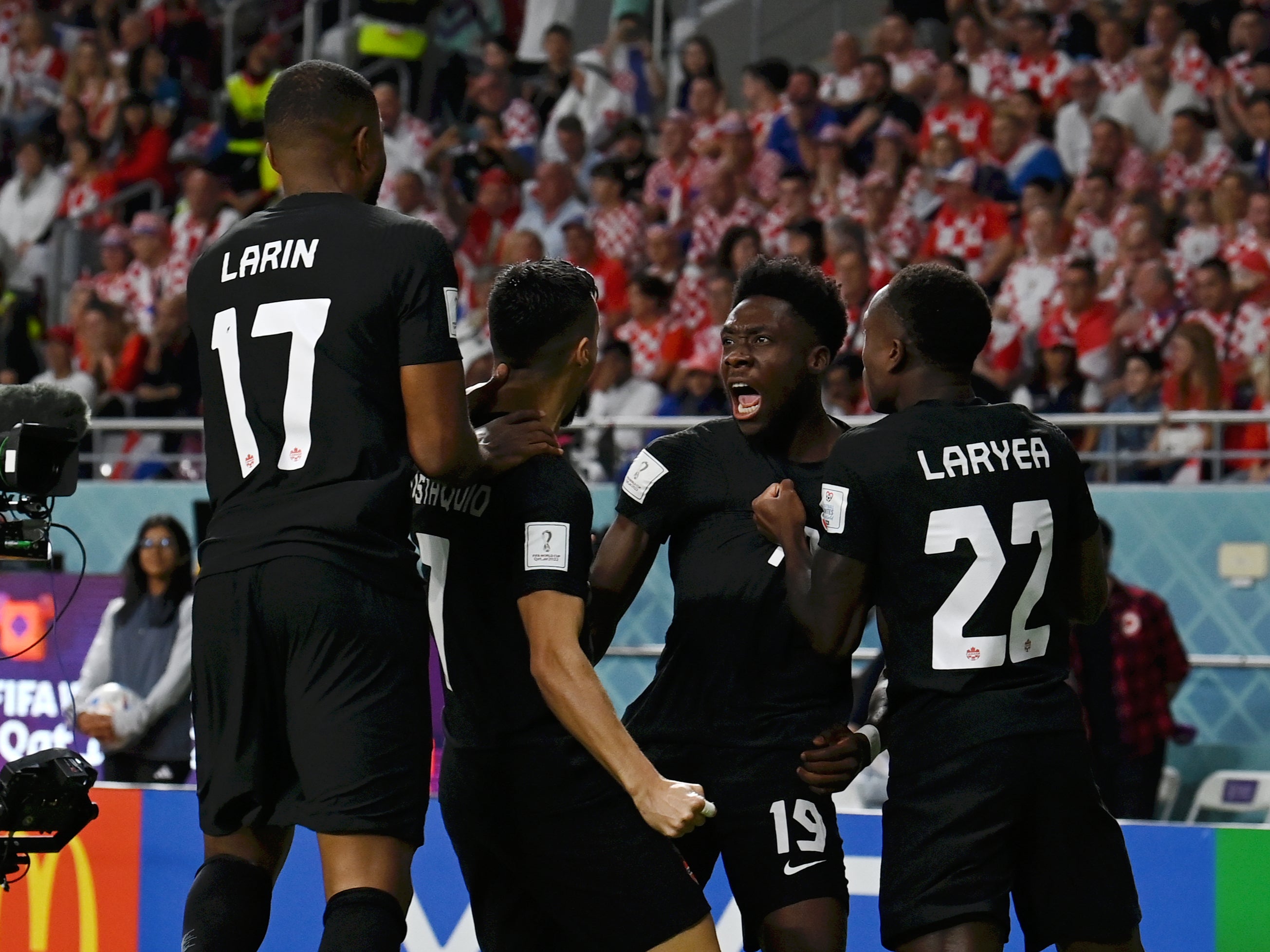 Fans celebrate Alphonso Davies' historic World Cup goal against