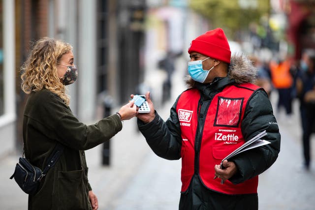 Big Issue vendors are to be given free sim cards and data vouchers to help them cope with the worsening cost-of-living crisis (David Parry/PA)