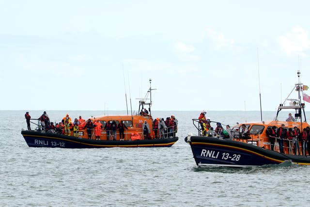 Dungeness and Hastings Lifeboats carrying groups of people thought to be migrants arrive in to Dungeness, Kent (Gareth Fuller/PA)