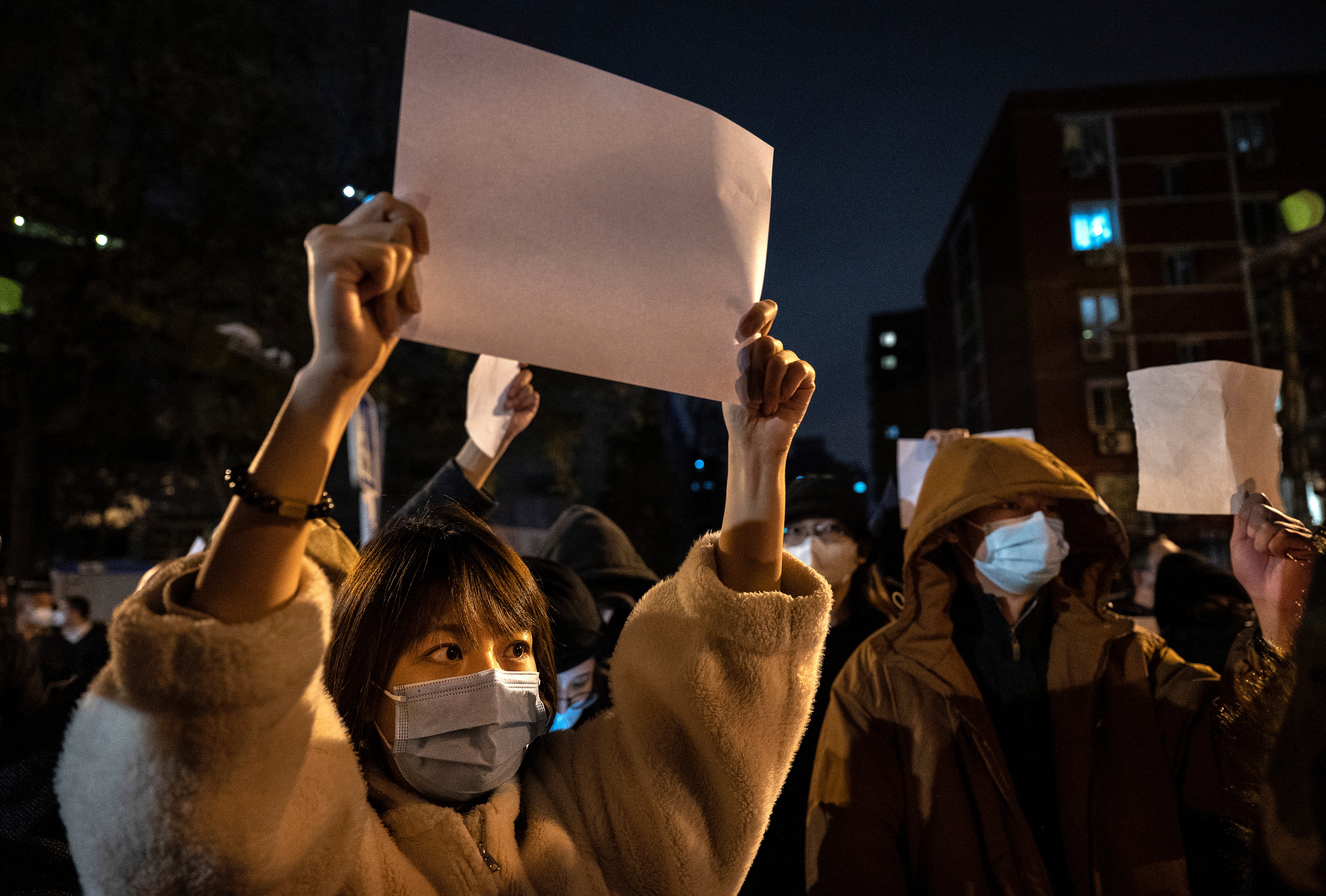 Protesters are raising blank A4 sheets, a symbol of defiance to signal how they are being silenced and also to taunt authorities as they cannot be arrested for holding signs saying nothing