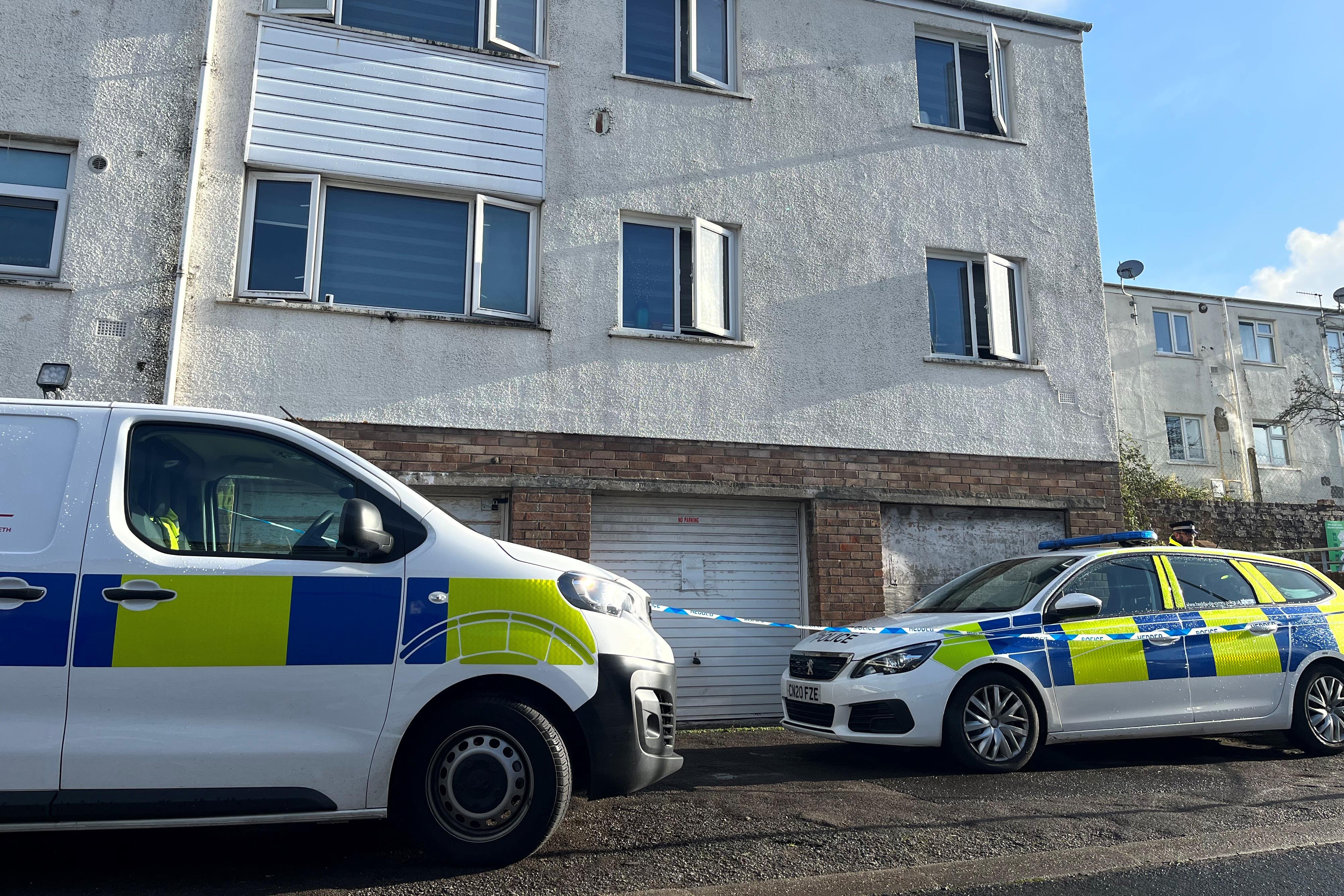 Three people remain in police custody following the discovery of the bodies of two babies at an end-of-terrace property in Wildmill, Bridgend (Rod Minchin/PA)