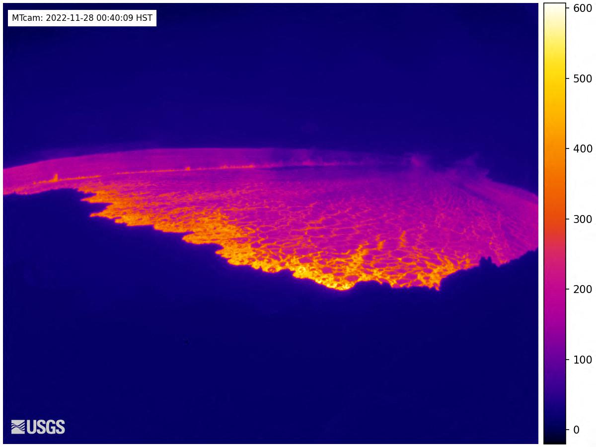 This image released by the US Geological Survey (USGS) on November 28, 2022 courtesy of the National Weather Service, shows a webcam view of the Mauna Loa volcano in Hawaii, which is erupting for the first time in nearly 40 years