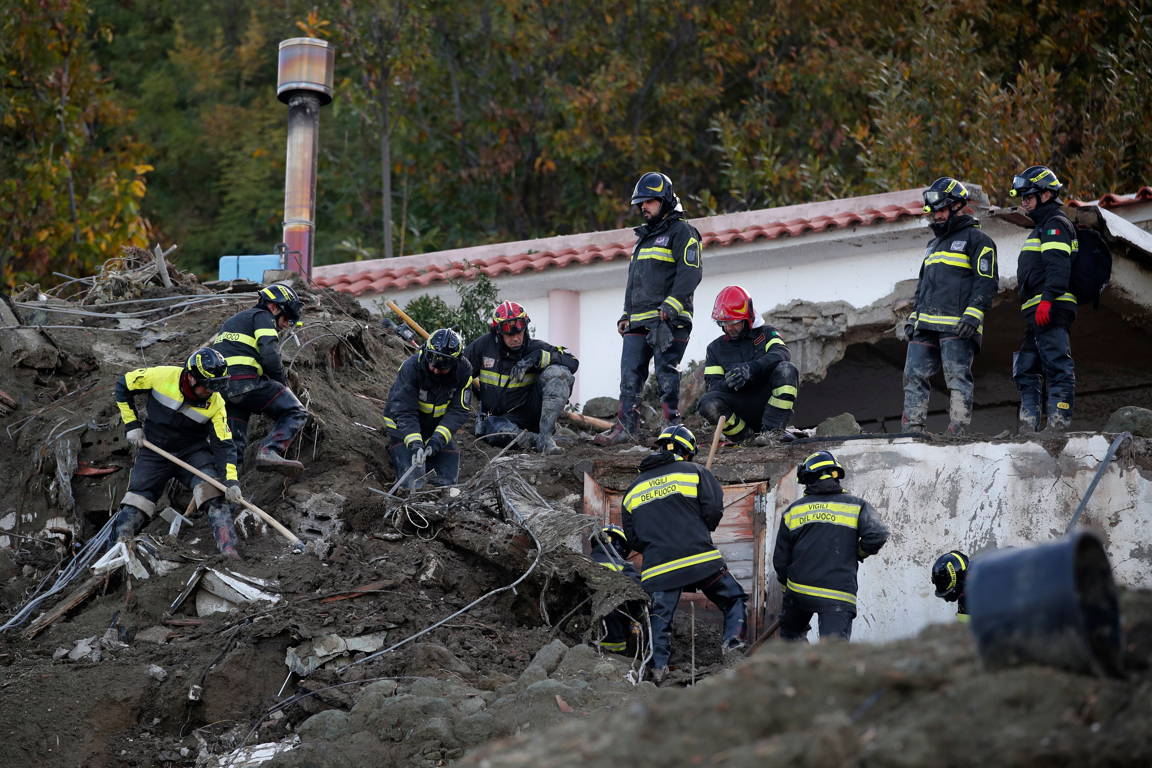Authorities said that the landslide swept parked cars into the sea