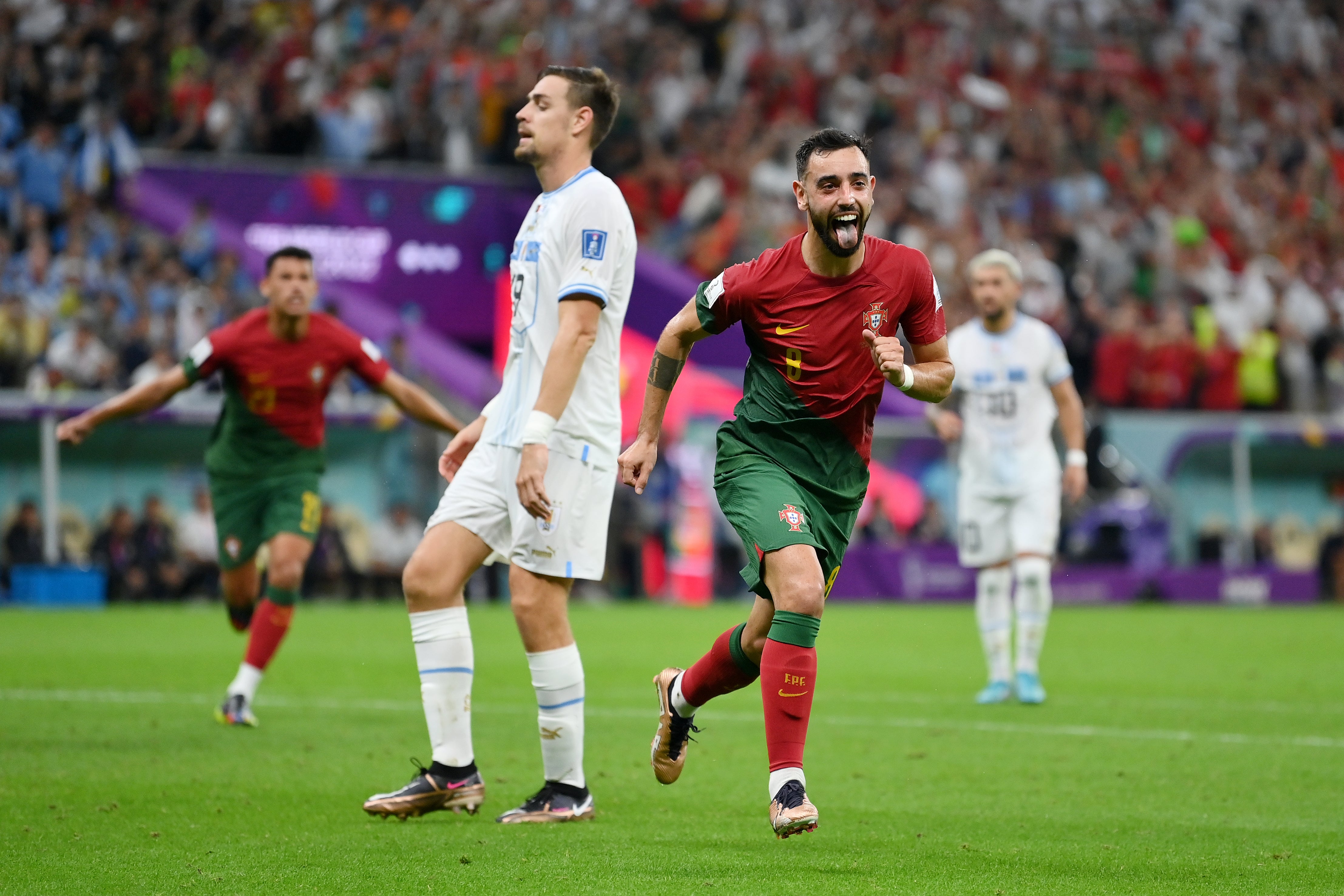 Bruno Fernandes of Portugal celebrates after scoring from the spot