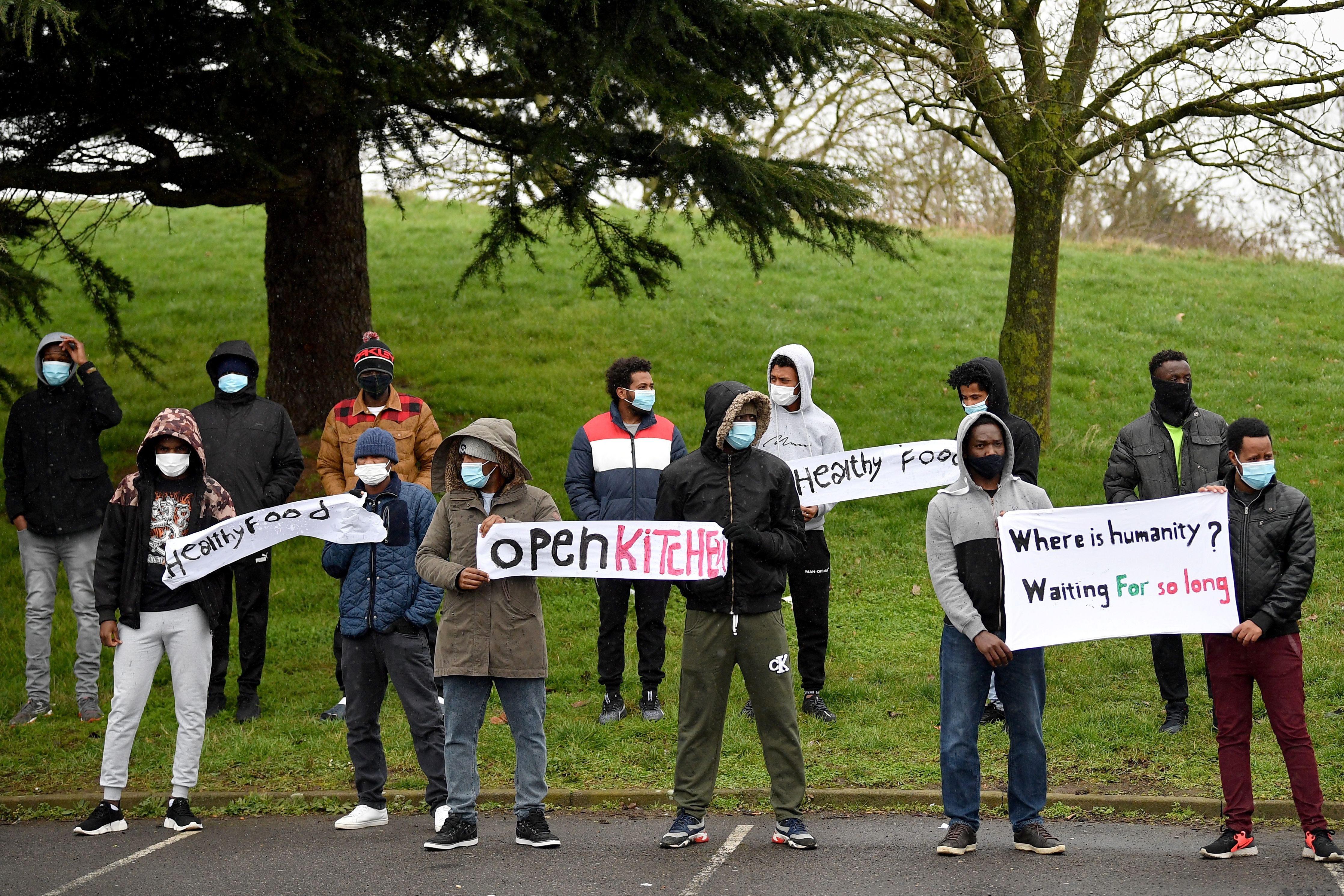 Asylum-seekers protesting outside a Home Office hotel