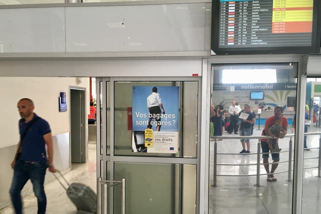 <p>Keep walking: A passenger just arrived at Nice-Côte d’Azur airport in southern France, an hour’s walk from the city centre</p>