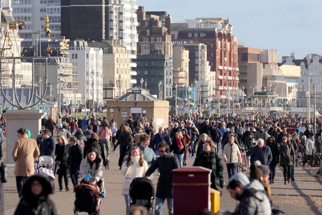 People on the sea front in Brighton during England’s third national lockdown to curb the spread of coronavirus.