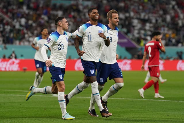 Phil Foden, left, and Marcus Rashford, centre, joined Harry Kane in the England front line (Martin Rickett/PA)