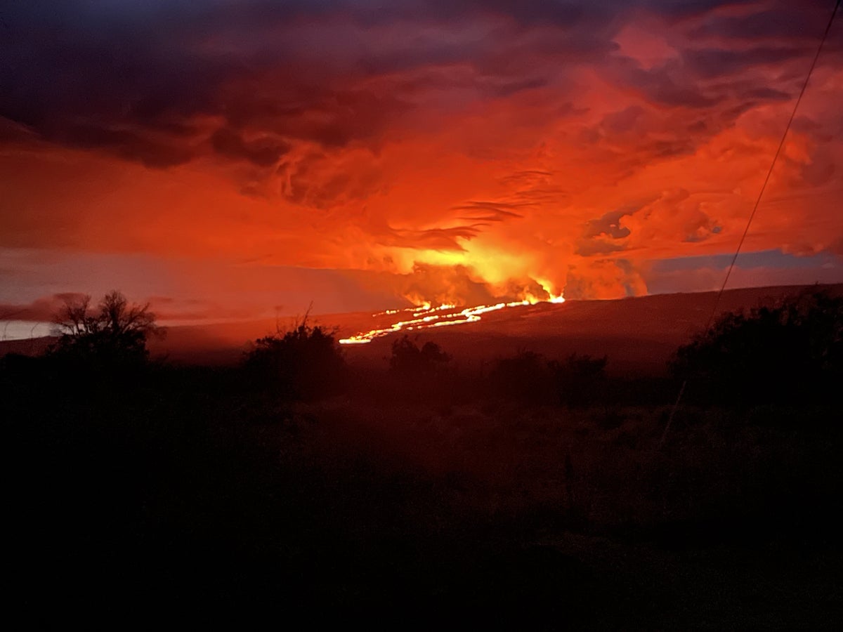 Mauna Loa eruption – latest: USGS warns lava likely to hit highway as tourists flock to volcano for selfies