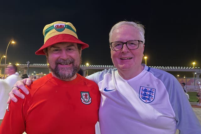 Wales fan Gethin Mark Harris, from East Anglia by way of Swansea with England fan Jonathan Lowe, from Cambridge who lives in Poland (Bronwen Weatherby/PA)