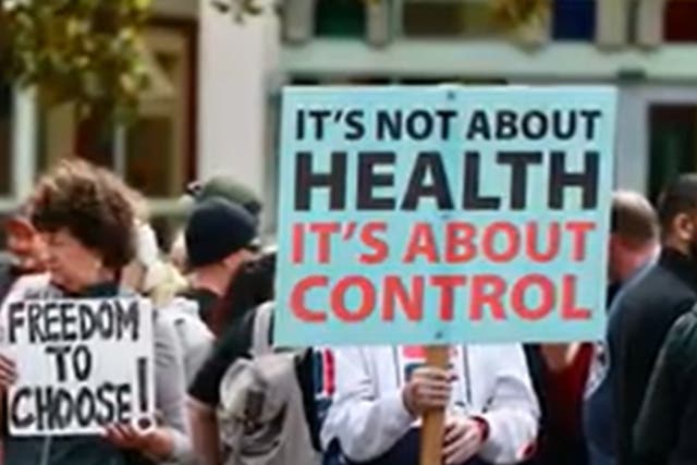 <p>Anti-vaxxers seen gathering outside of the court in Auckland, New Zealand as the country’s health agency seeks guardianship of a baby in need of heart surgery after the parents refused to allow blood from vaccinated people to be used</p>