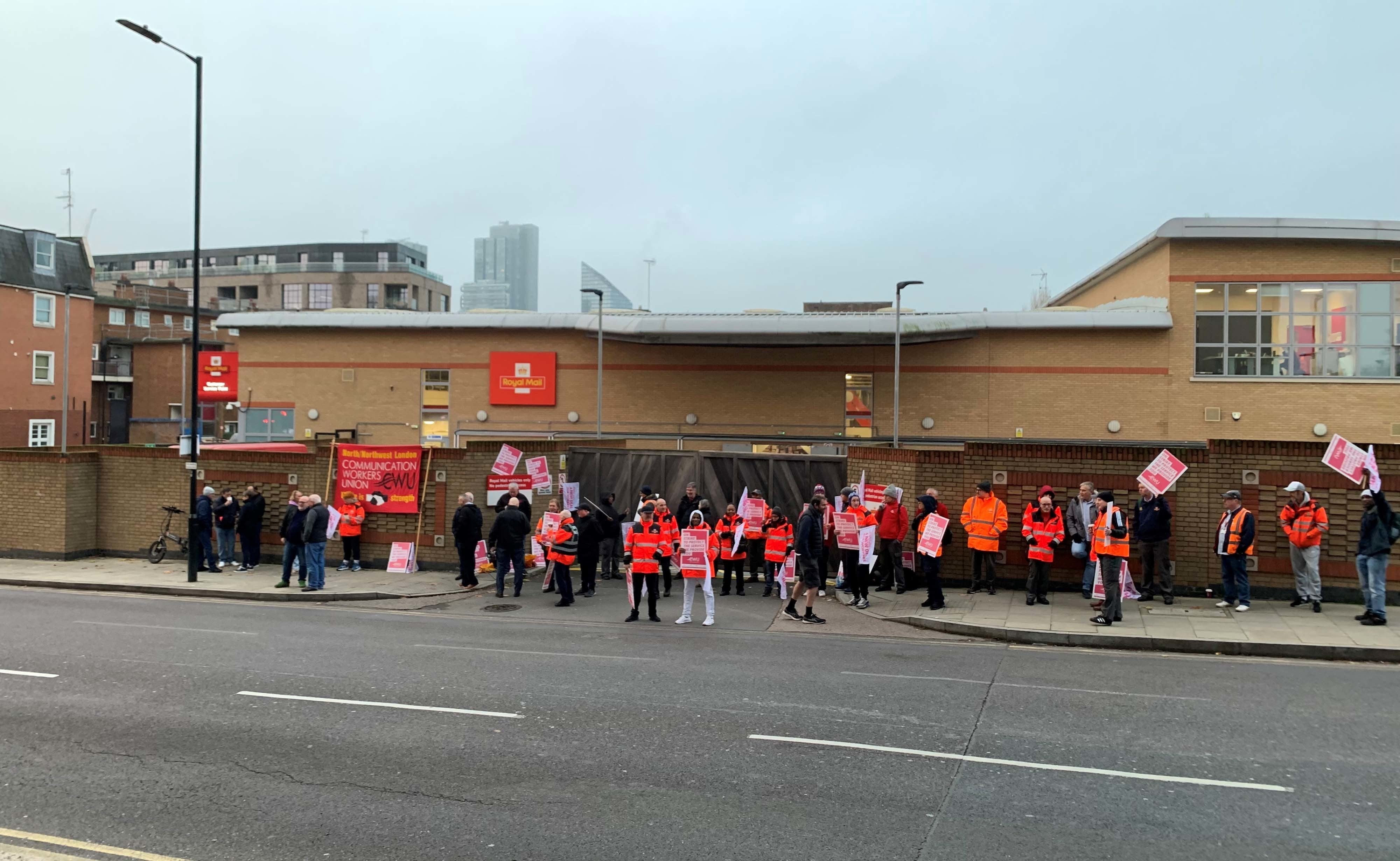 Striking postal workers outside the Royal Mail Islington Delivery Office in November