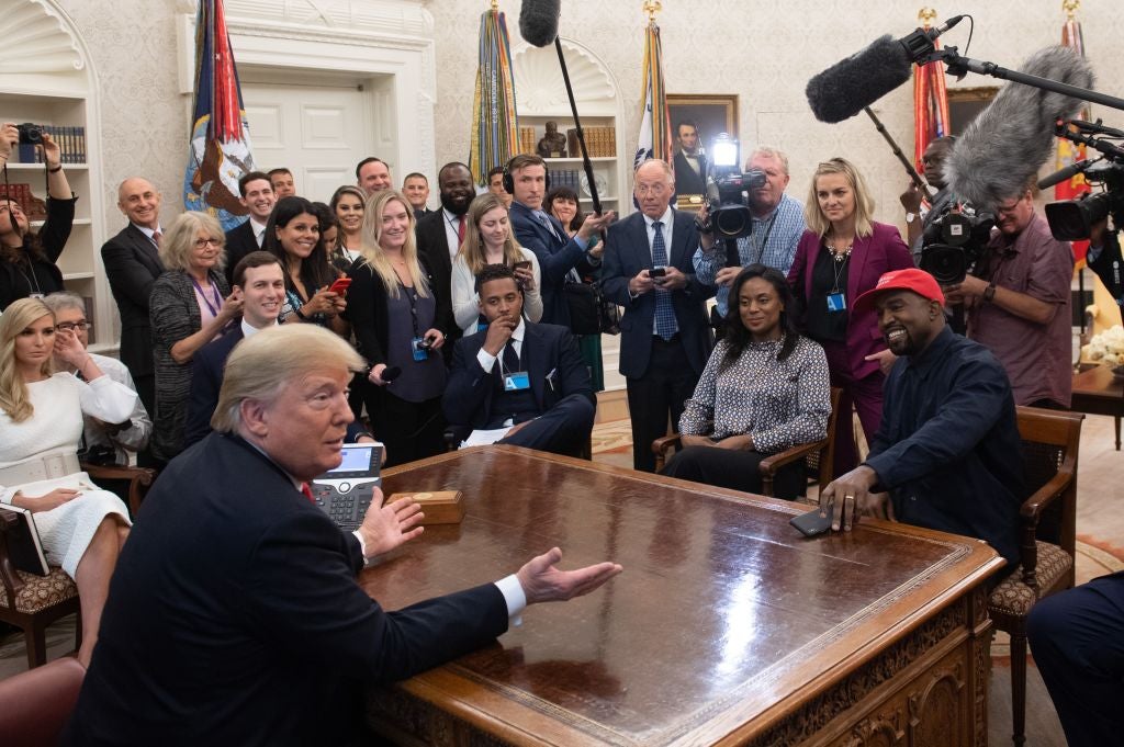 Donald Trump and Kanye West meet in the Oval Office in 2018