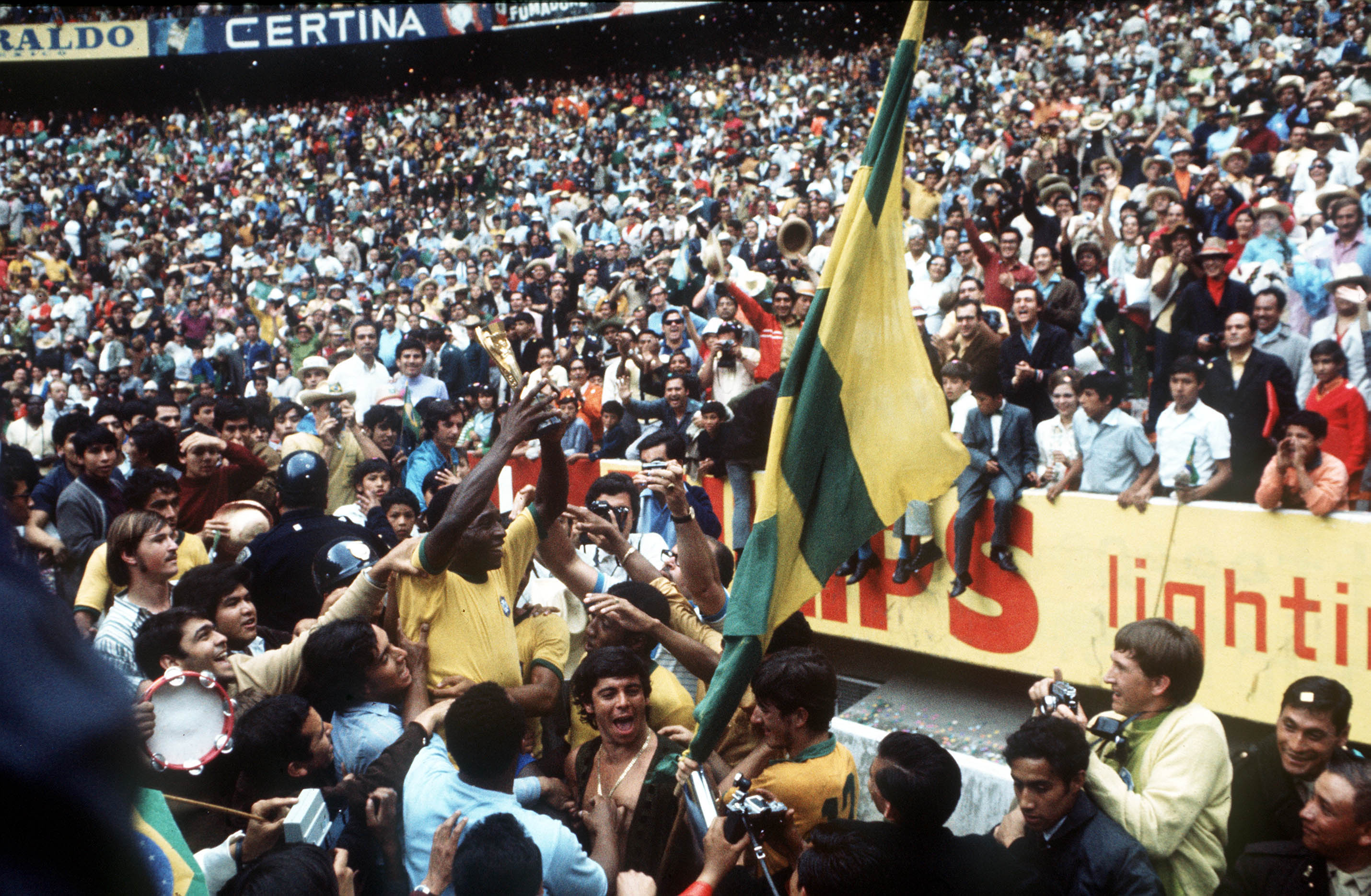 Pele holds aloft the World Cup trophy – his and Brazil’s third – in 1970